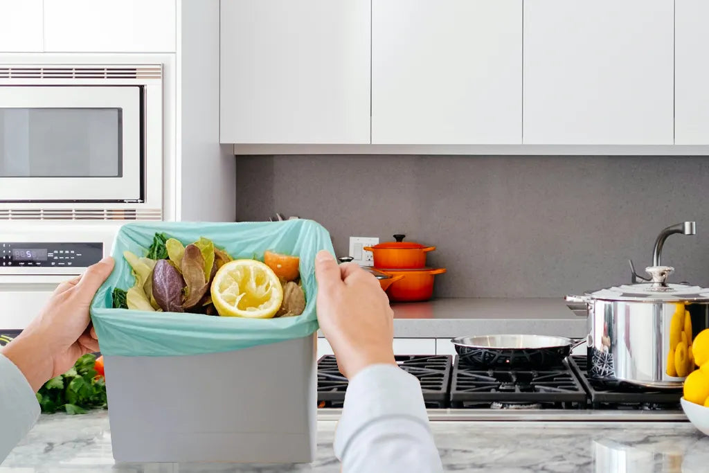 Degradable Handle-Tie Trash Bags are ideal for kitchen food waste disposal.
